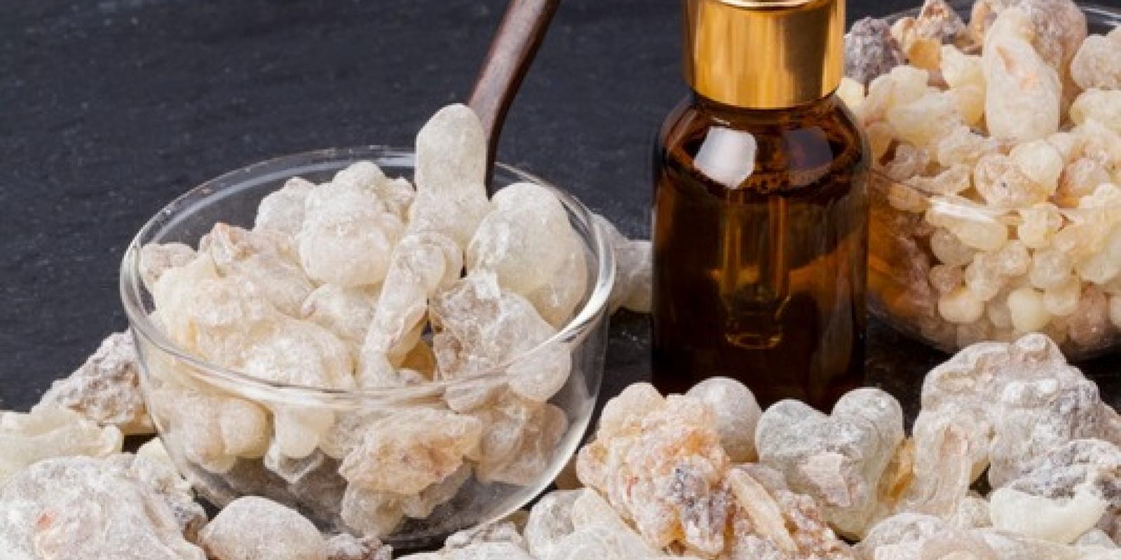 Bottle with organic essential aroma oil from Boswellia sacra tree and Frankincense insence.
