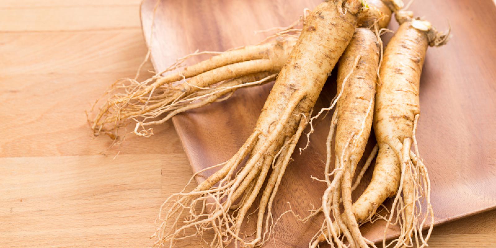 Korean ginseng over wooden plate